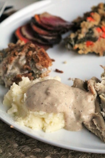 Creamy Poblano Bacon Gravy on mashed potatoes