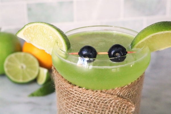 Baby Yoda Cocktail with lime ears and blueberry eyes
