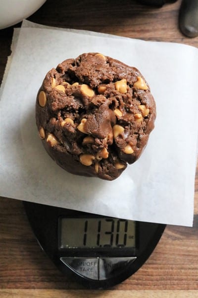 Giant Chocolate Peanut Butter Chip Cookie Dough on a scale