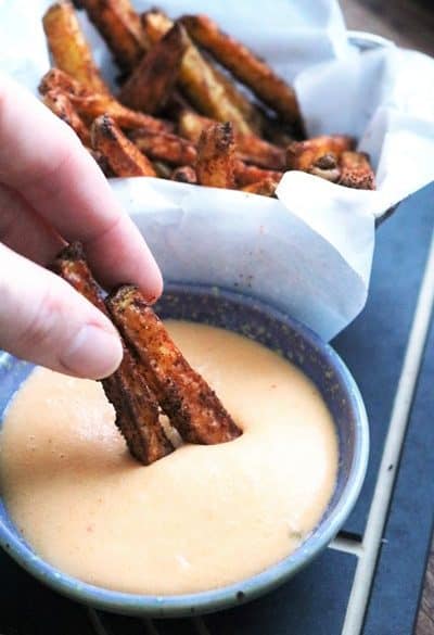 Baked Nacho Fries dipped in Nacho Cheese