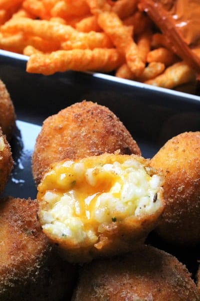 Cheese Doodle Crusted Cheddar Stuffed Arancini.