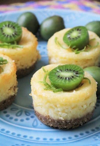 Coconut Key Lime Mini Cheesecakes topped with Kiwi Berries