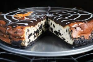 Slice of Oreo Spiderweb Cheesecake