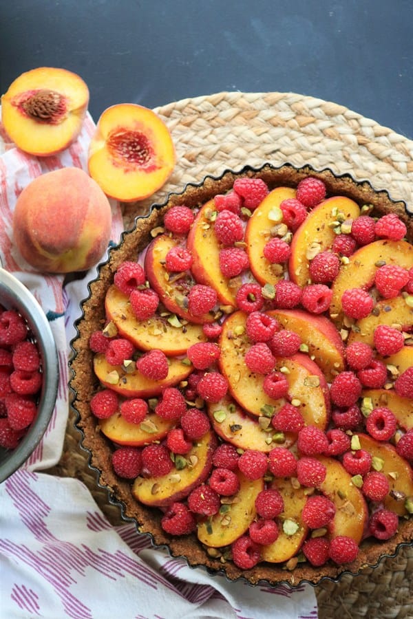 Peach Raspberry Tart with Coconut-Pistachio Crust