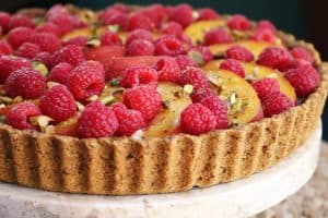 Peach Raspberry Mascarpone Tart with Coconut-Pistachio Crust