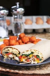 Better Breakfast Burritos with Turkey Sausage, Eggs, Bell Pepper, Spinach, Feta, and Whole Wheat Tortilla.