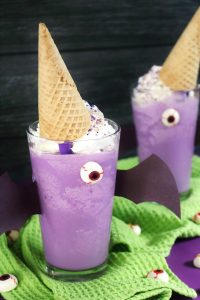 Purple Sweet Potato Ube Milkshakes Dressed up as Flying Purple People Eaters.