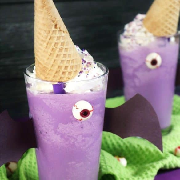 Purple Sweet Potato Ube Milkshakes Dressed up as Flying Purple People Eaters.