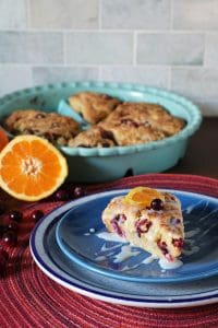 White Chocolate Glazed Cranberry Orange Scone on a plate.