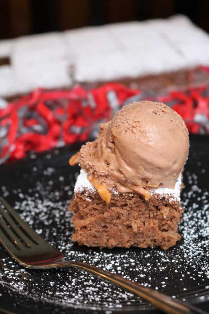 Tailgate Cake topped with ice cream.