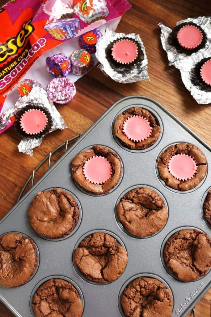 Mini Peanut Butter Cup in Brownies in pan.