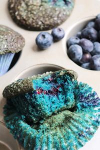 Bite out of a Blue Poop Challenge Muffin.
