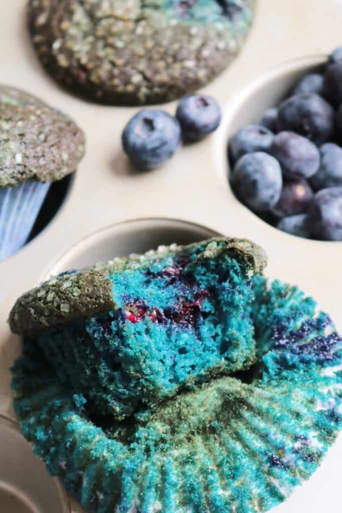 Bite out of a Blue Poop Challenge Muffin.