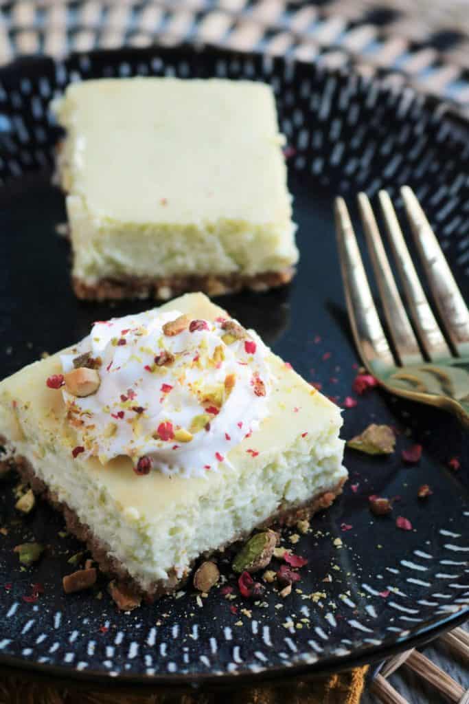 Key Lime Pistachio Cheesecake Bars on a plate.