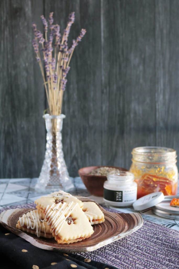 Lavender Linzer Cookies with Kumquat Marmalade on a Plate.