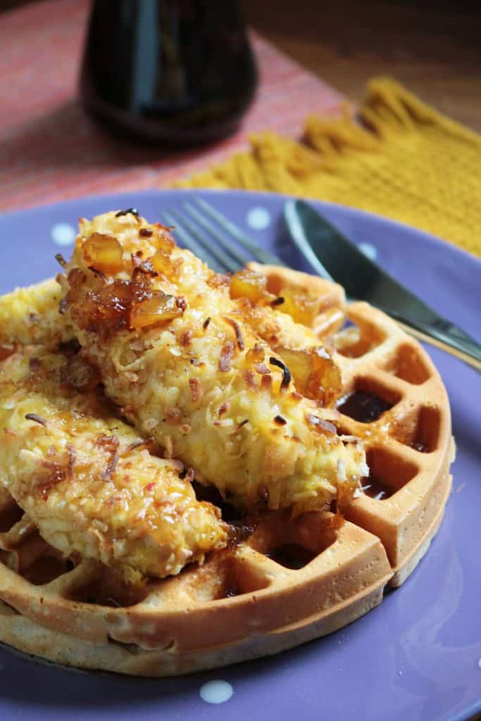 Coconut Chicken and Waffles served with Homemade Pink Peppercorn Pineapple Syrup.