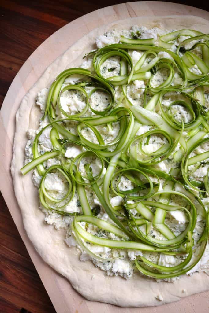 Shaved Asparagus Ricotta Pizza before baking.