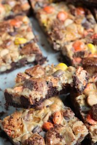 Teeth marks in a Chocolate Peanut Butter 7-Layer Bar.