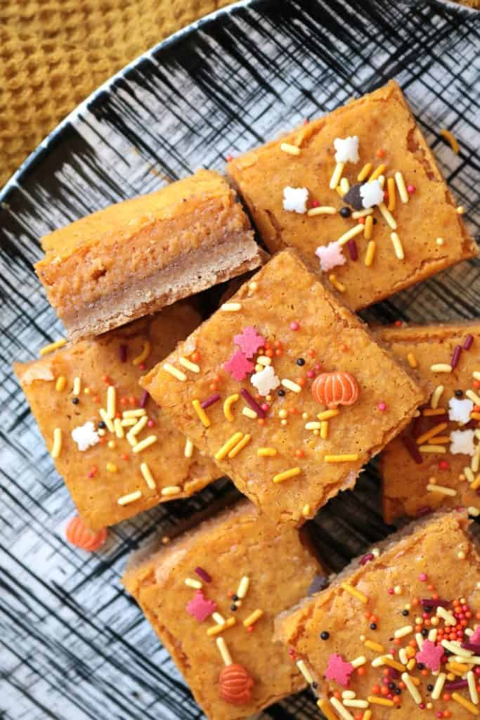 Pumpkin Gooey Butter Cake topped with Sprinkles.