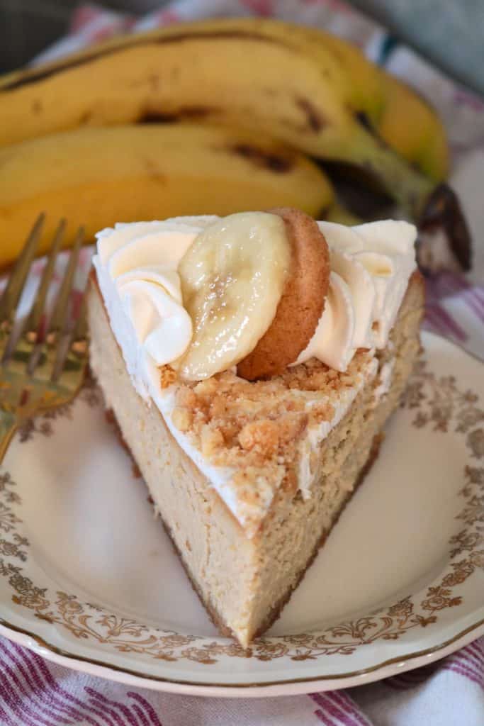 Slice of Banana Pudding Cheesecake with a fork.