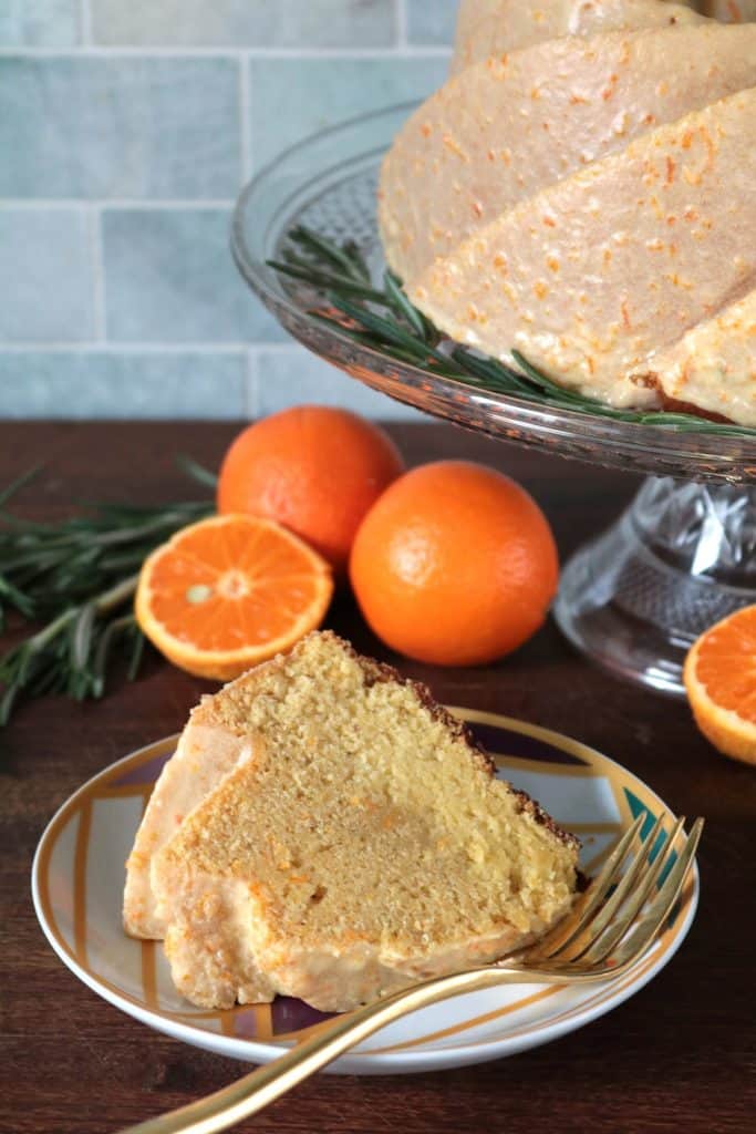 Slice of Tangerine Rosemary Olive Oil Cake on a plate.