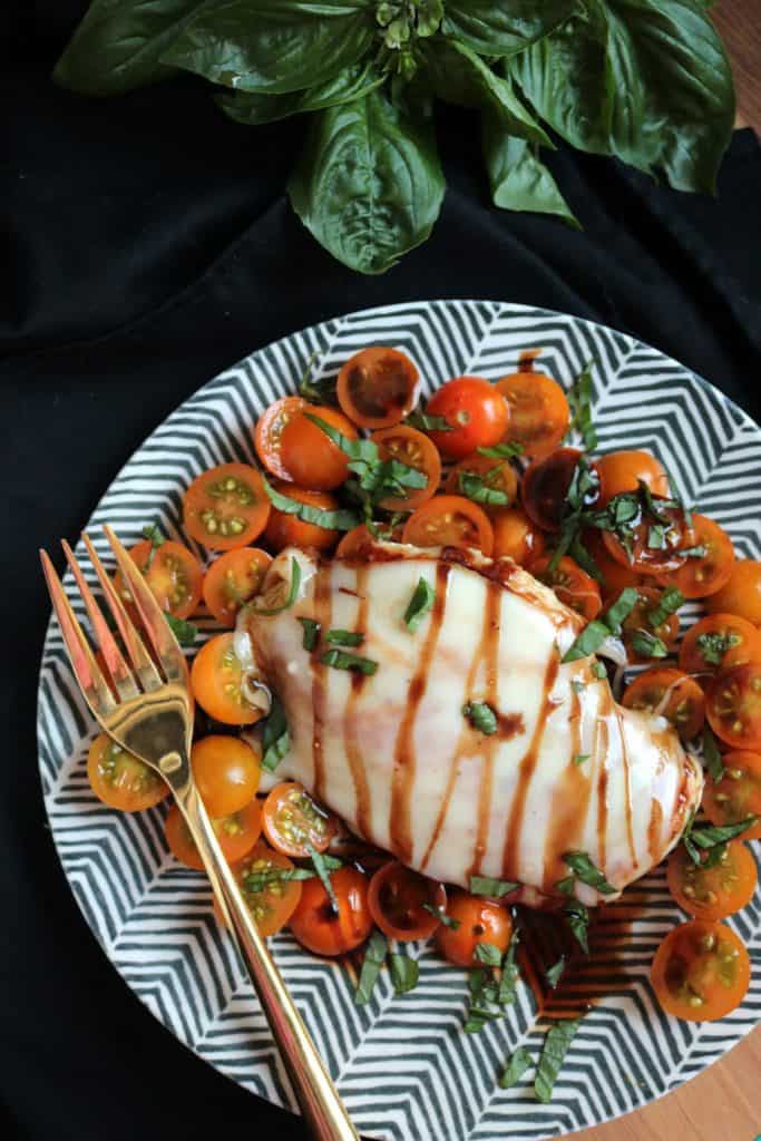 Caprese grilled chicken with balsamic reduction.