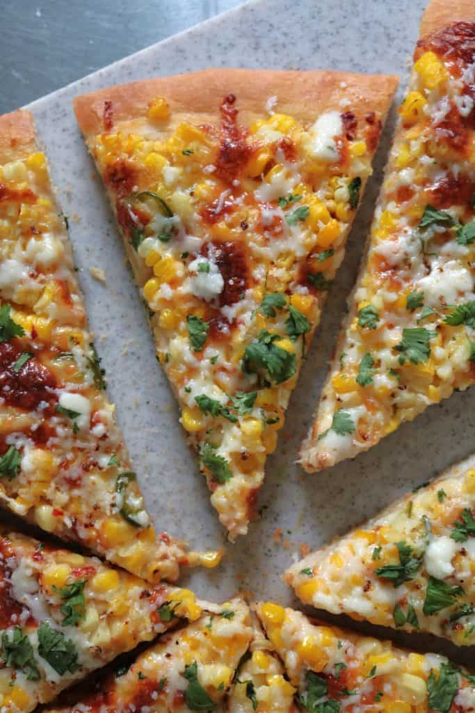 Slice of Mexican Street Corn Pizza.