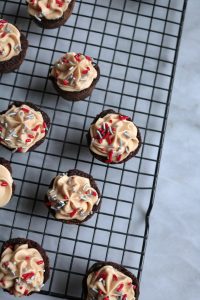 Buckeye Chocolate Cookie Cups with Peanut Butter Frosting.