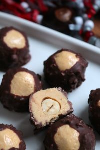 Ferrero Rocher-Inspired Buckeyes with a Hazelnut Stuffed Inside.