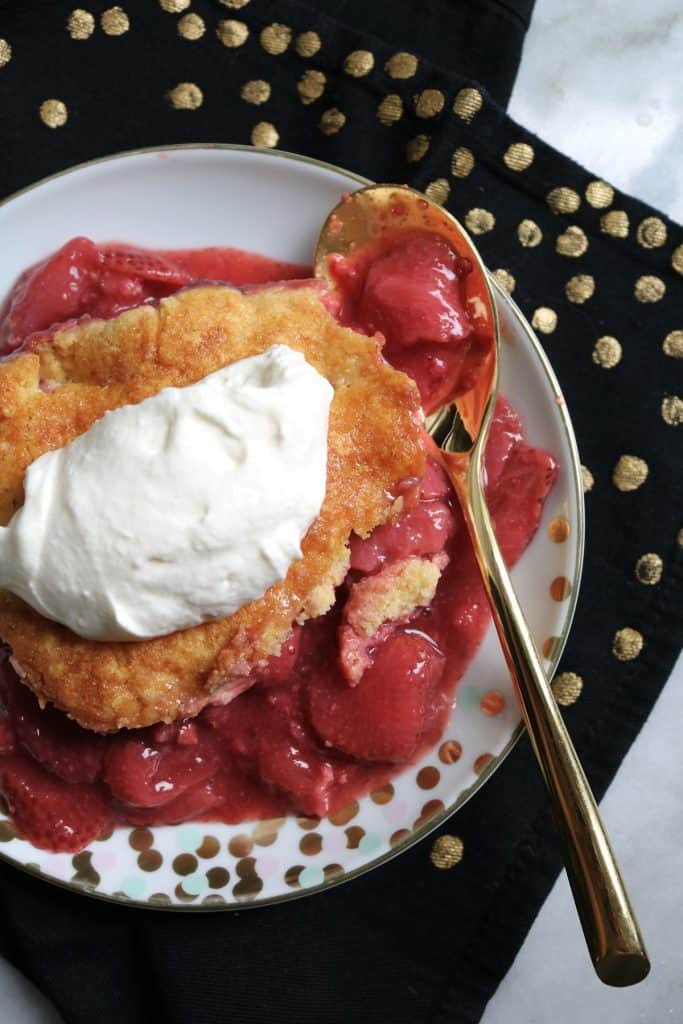 Strawberry Shortcake Cobbler with Whipped Cream.
