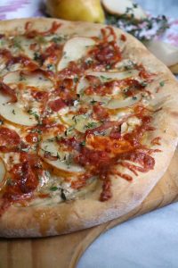 Gorgonzola Pear Pizza topped with Honey.
