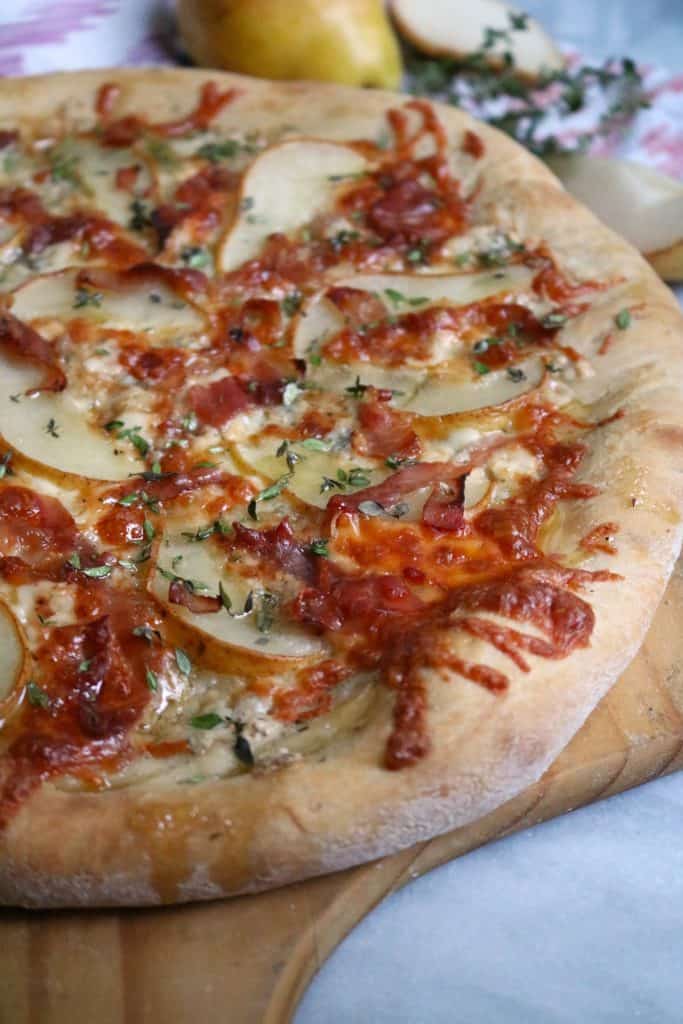 Gorgonzola Pear Pizza topped with Honey.