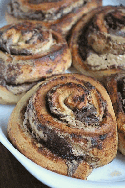 Glazed Chocolate Peanut Butter Cinnamon Rolls.