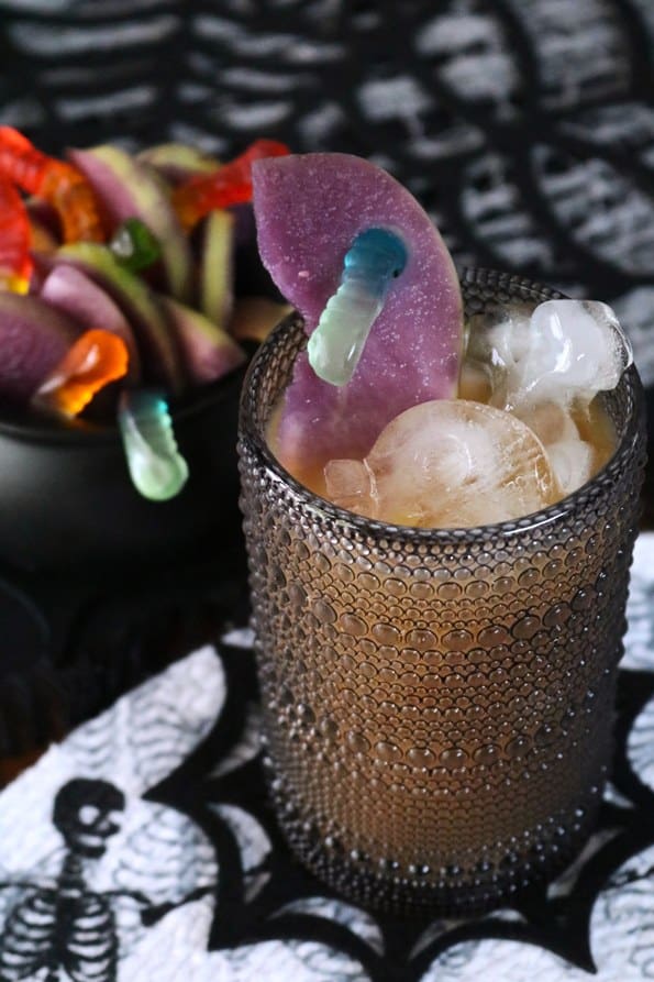 Poison Apple Cider with Gummy Worm.