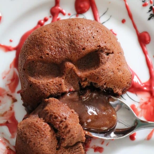 Skull Lava Cakes on a plate with red chocolate "blood".
