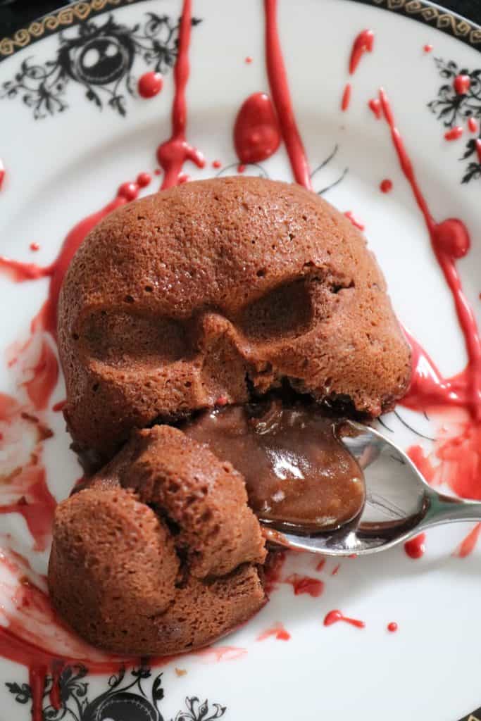 Skull Lava Cakes on a plate with red chocolate "blood".