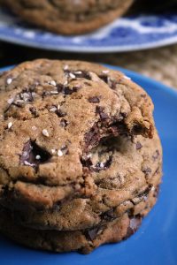 Bite out of a Tahini Dark Chocolate Chip Cookie.