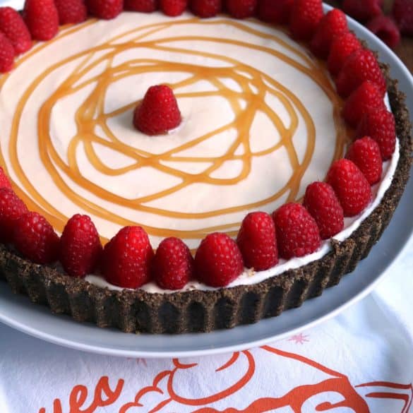 No-Bake White Chocolate Pie topped with Raspberries.