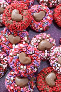 Valentine's Day Sprinkles Reese’s Mini Hearts Chocolate Blossom Cookies.