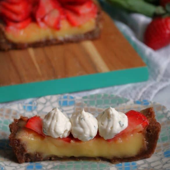Slice of Strawberry Basil Lime Curd Tart.