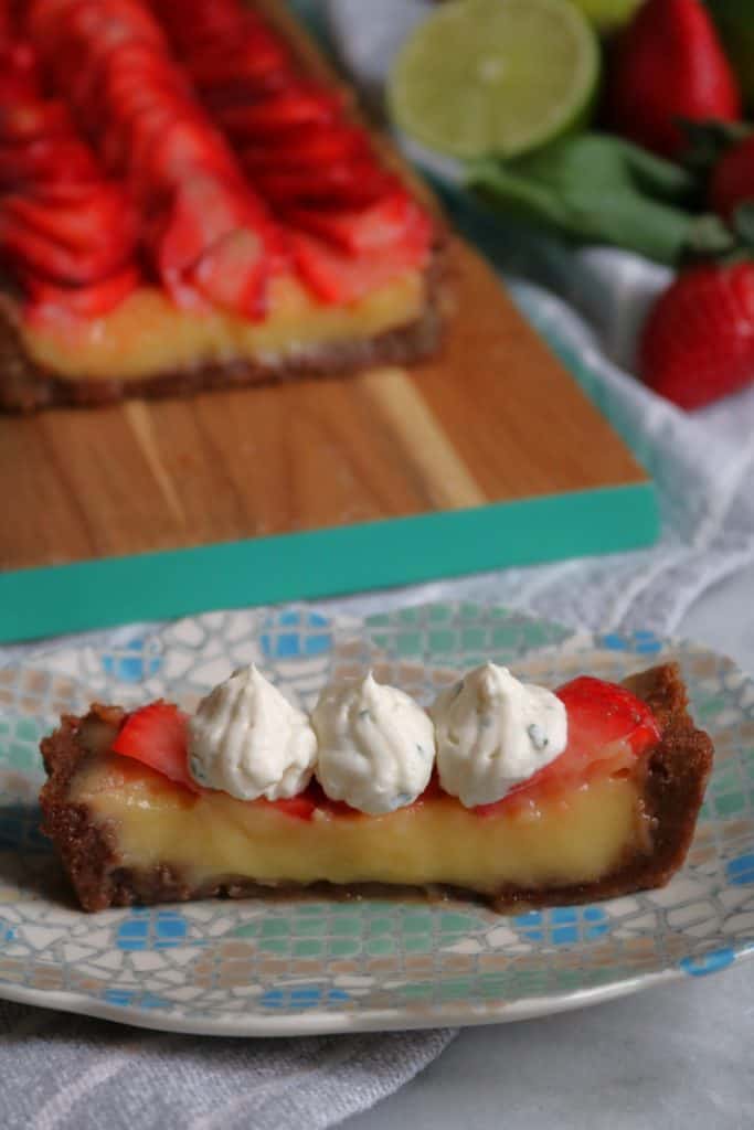 Slice of Strawberry Basil Lime Curd Tart.