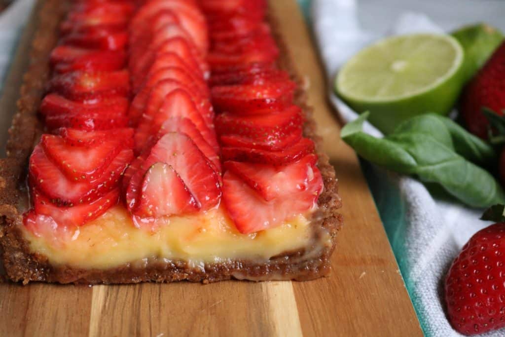 Sliced Strawberry Basil Lime Curd Tart.