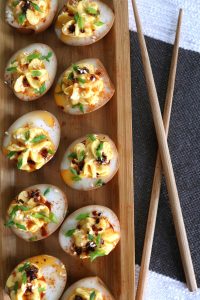 Soy Marinated Asian Deviled Eggs with Chopsticks.