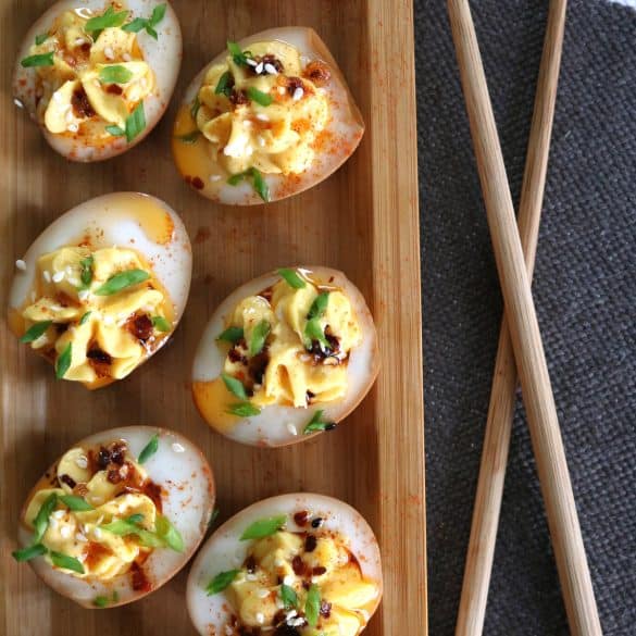 Soy Marinated Asian Deviled Eggs with Chopsticks.