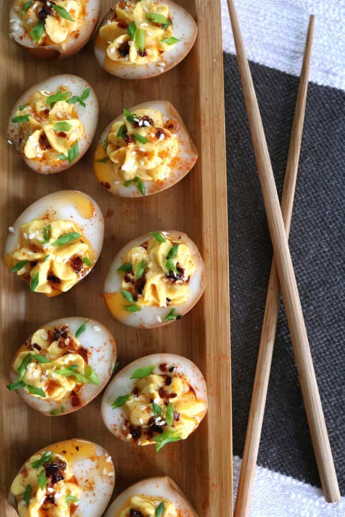 Soy Marinated Asian Deviled Eggs with Chopsticks.