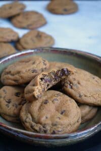 Bite out of Chocolate Chip Ginger Molasses Cookies.