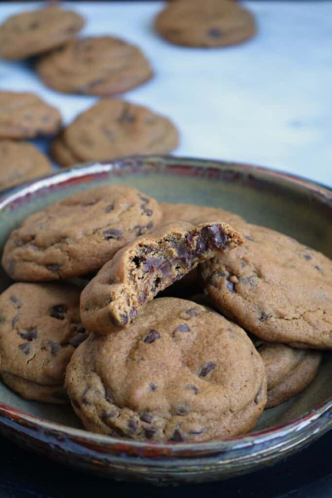 Bite out of Chocolate Chip Ginger Molasses Cookies.