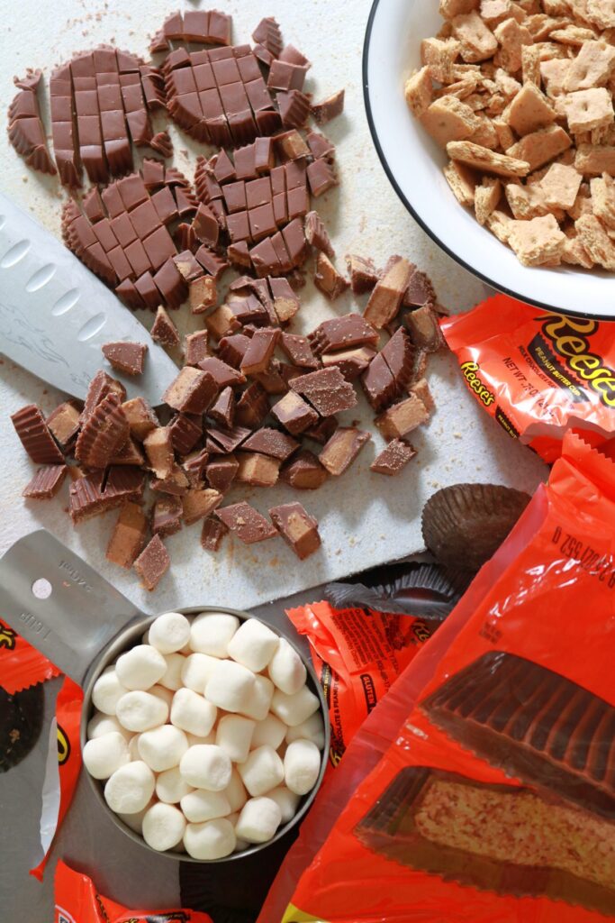 Some ingredients for Peanut Butter S’mores Cheesecake Bars.